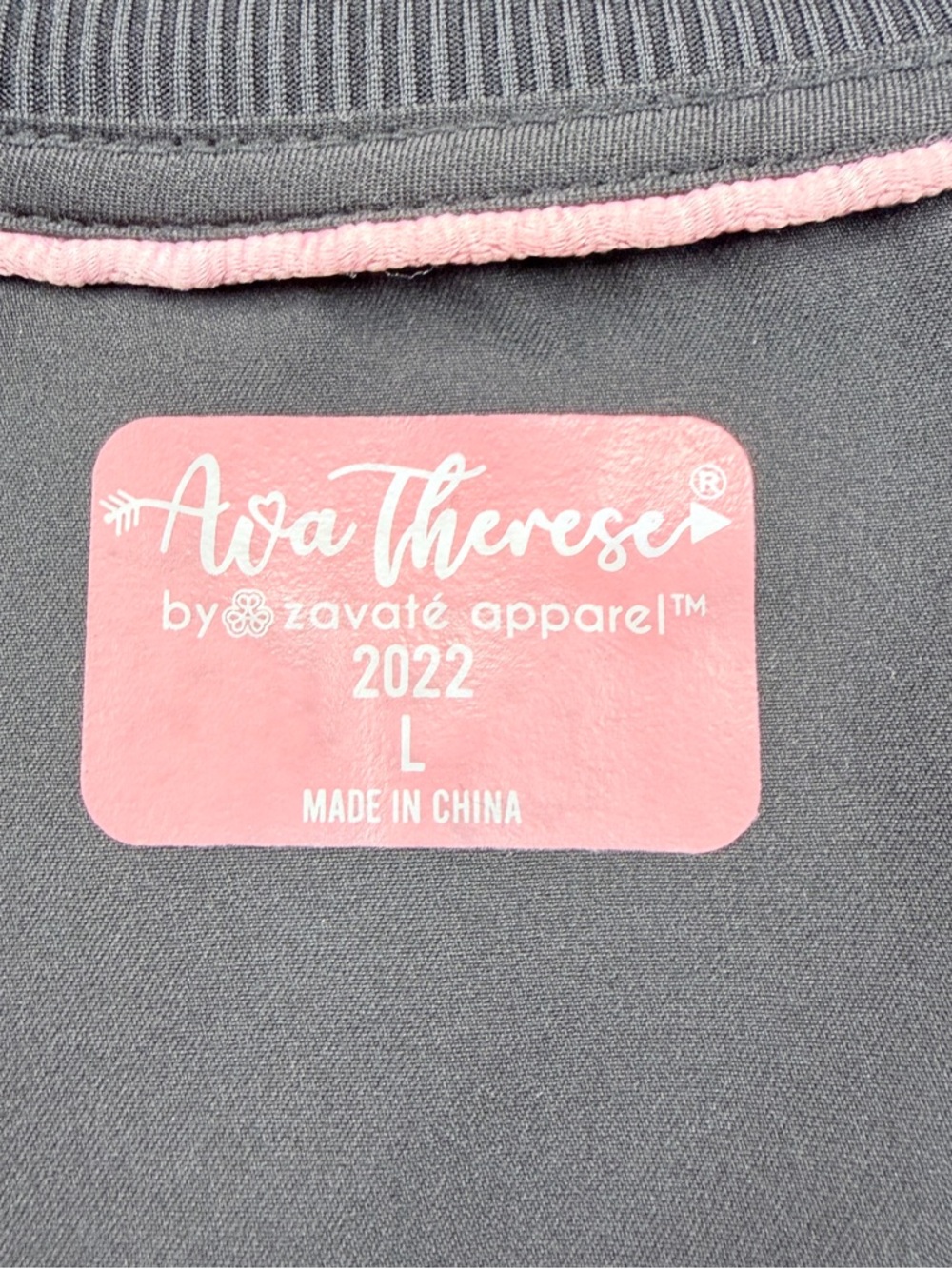 Ava Therese collection by Zavaté Apparel.
Women’s Black Zip-Front Scrub Jacket - Picture 7 of 11